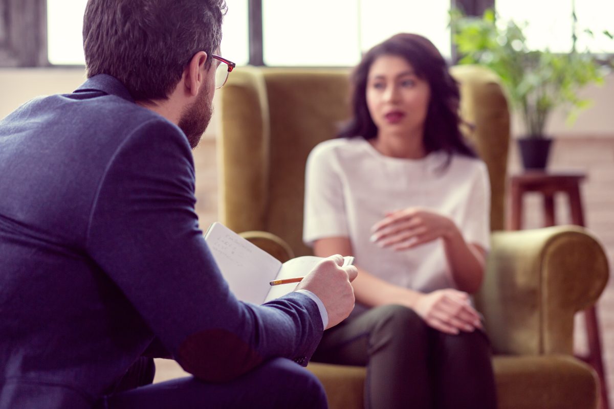 Employee talking to a counselor
