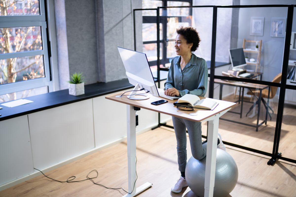 Woman working at a standing desk
