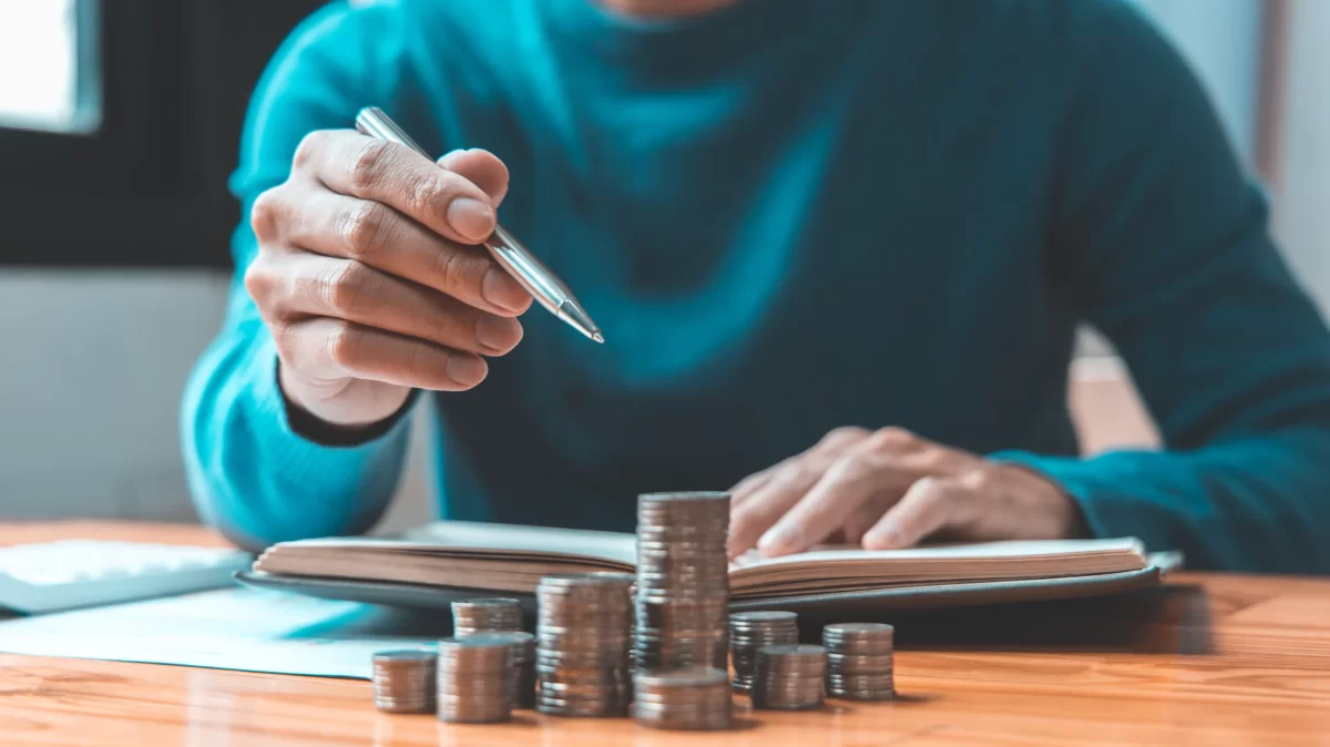 Man counting coins
