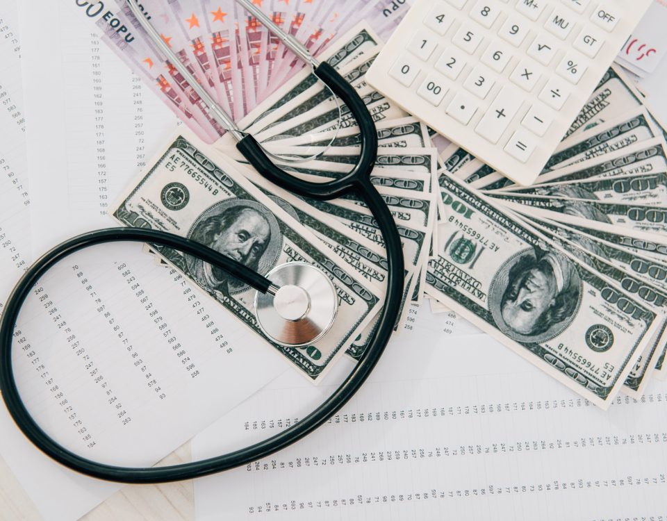 Money and stethoscope