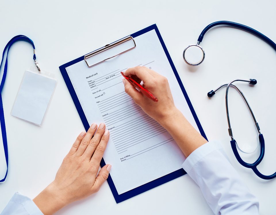 Filling out open enrollment paperwork