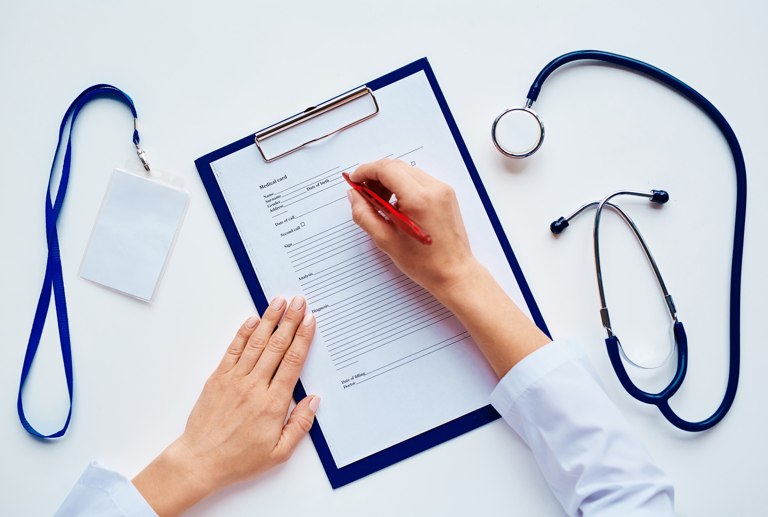 Filling out open enrollment paperwork