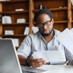 business man looking at papers