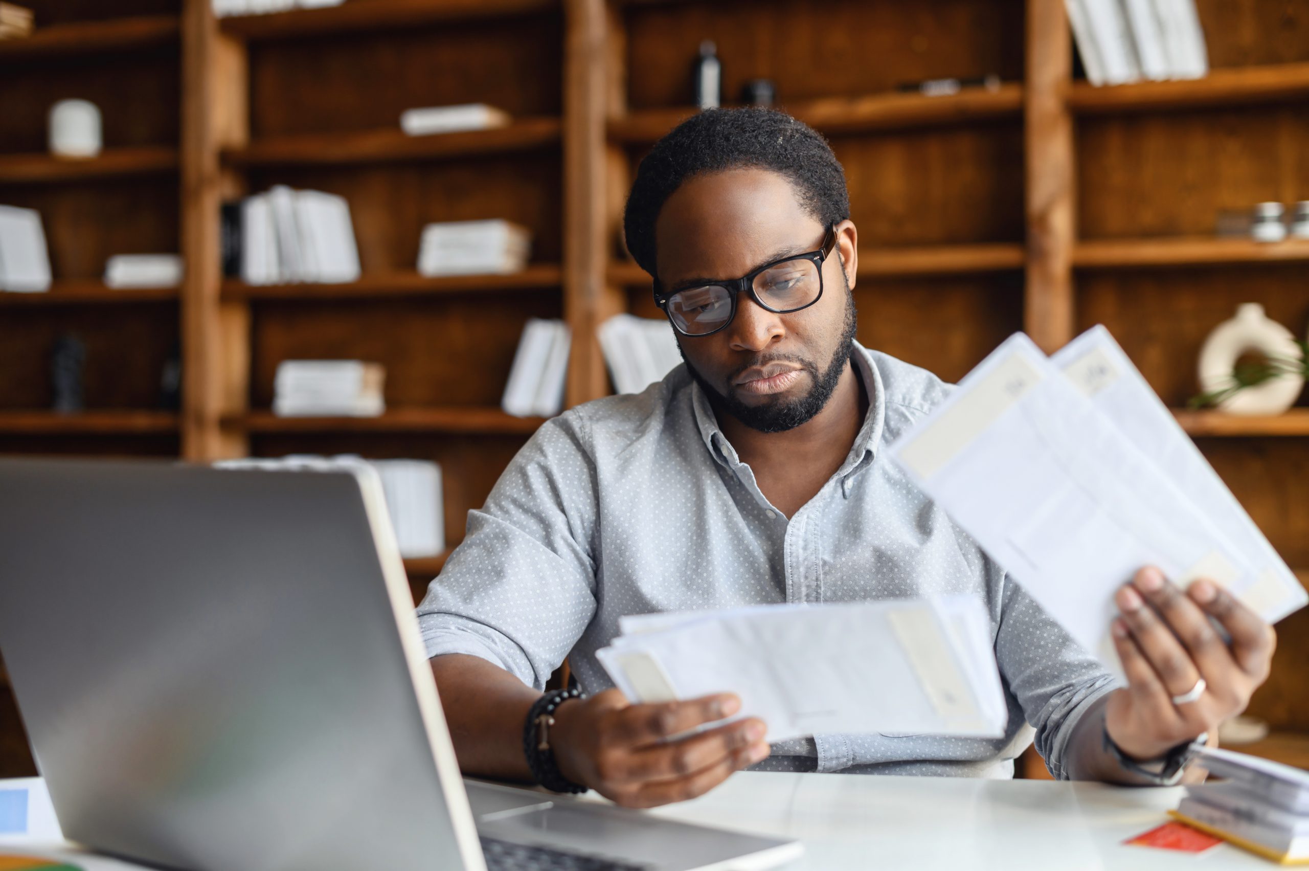 business man looking at papers