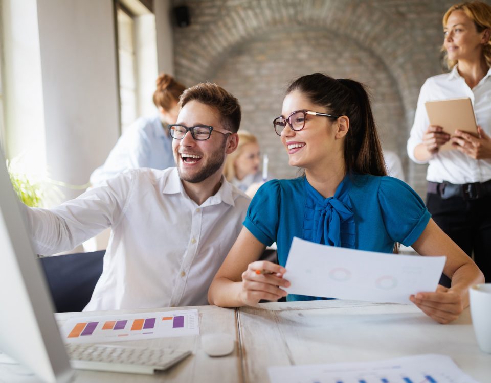 Happy and healthy employees working together