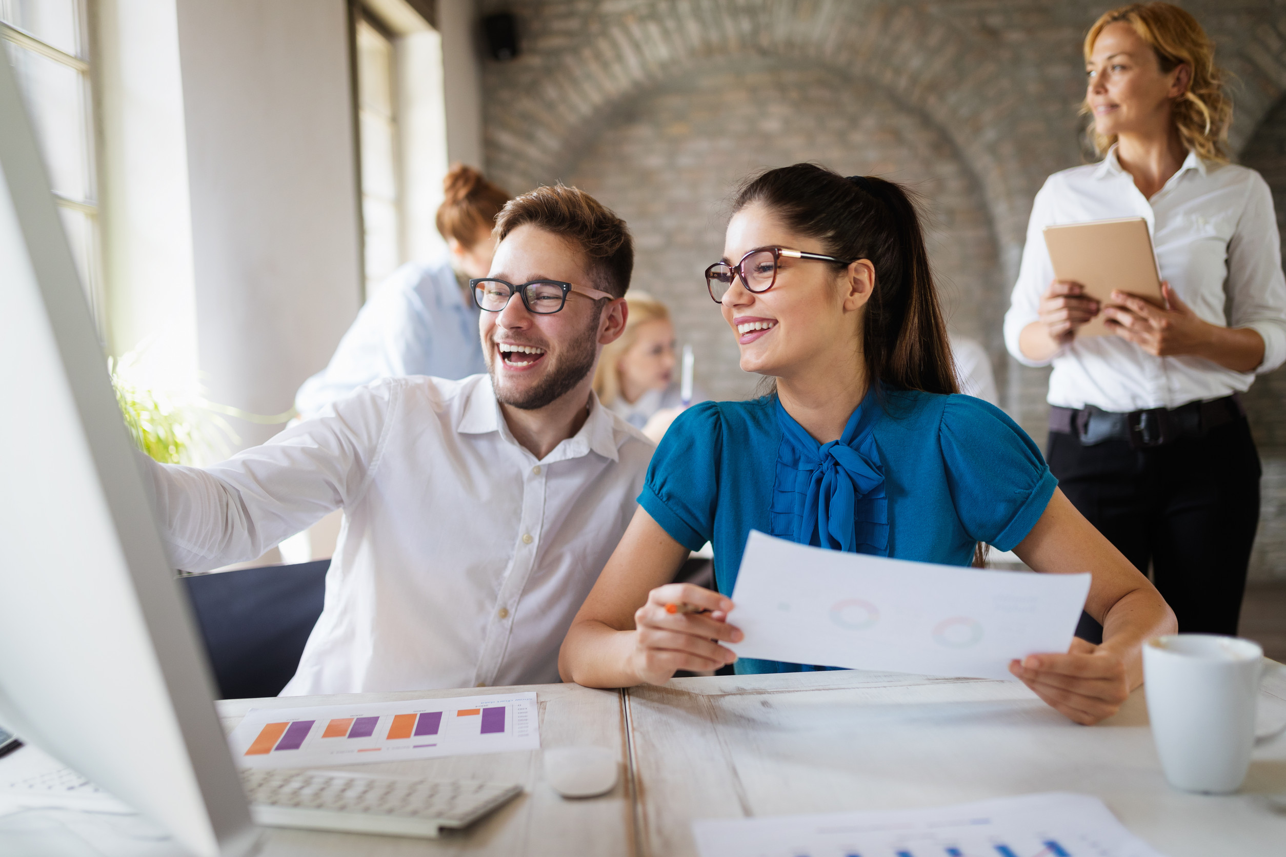 Happy and healthy employees working together