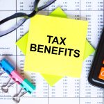 Tax benefits written on a sticky note
