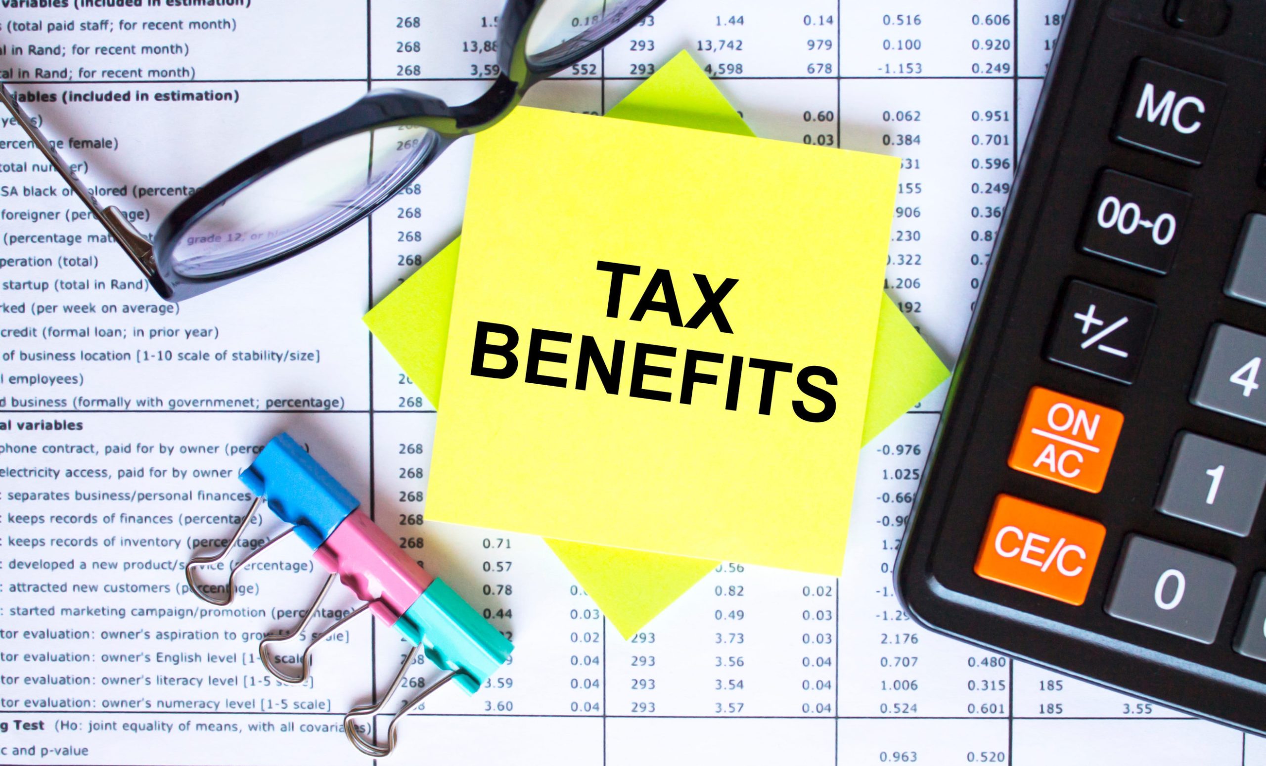 Tax benefits written on a sticky note